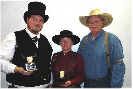 Ocoee Red (R) Presents The 2008 TOP GUN Award to Unpleasant (L) And The 2008 Top Cowgirl Shooter Award To Last Kiss (C)