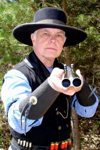 El Carrera Shows the Business End of His Shotgun.