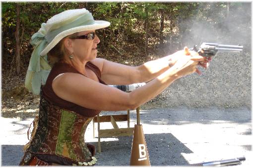 TOP COWGIRL SHOOTER AMOROUS ALI DEMONSTRATING HER SHOOTING SKILLS ON A MORE CIVILIZED DAY