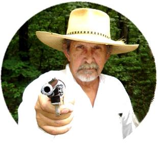 Owlhoot oval pistol in hand.jpg